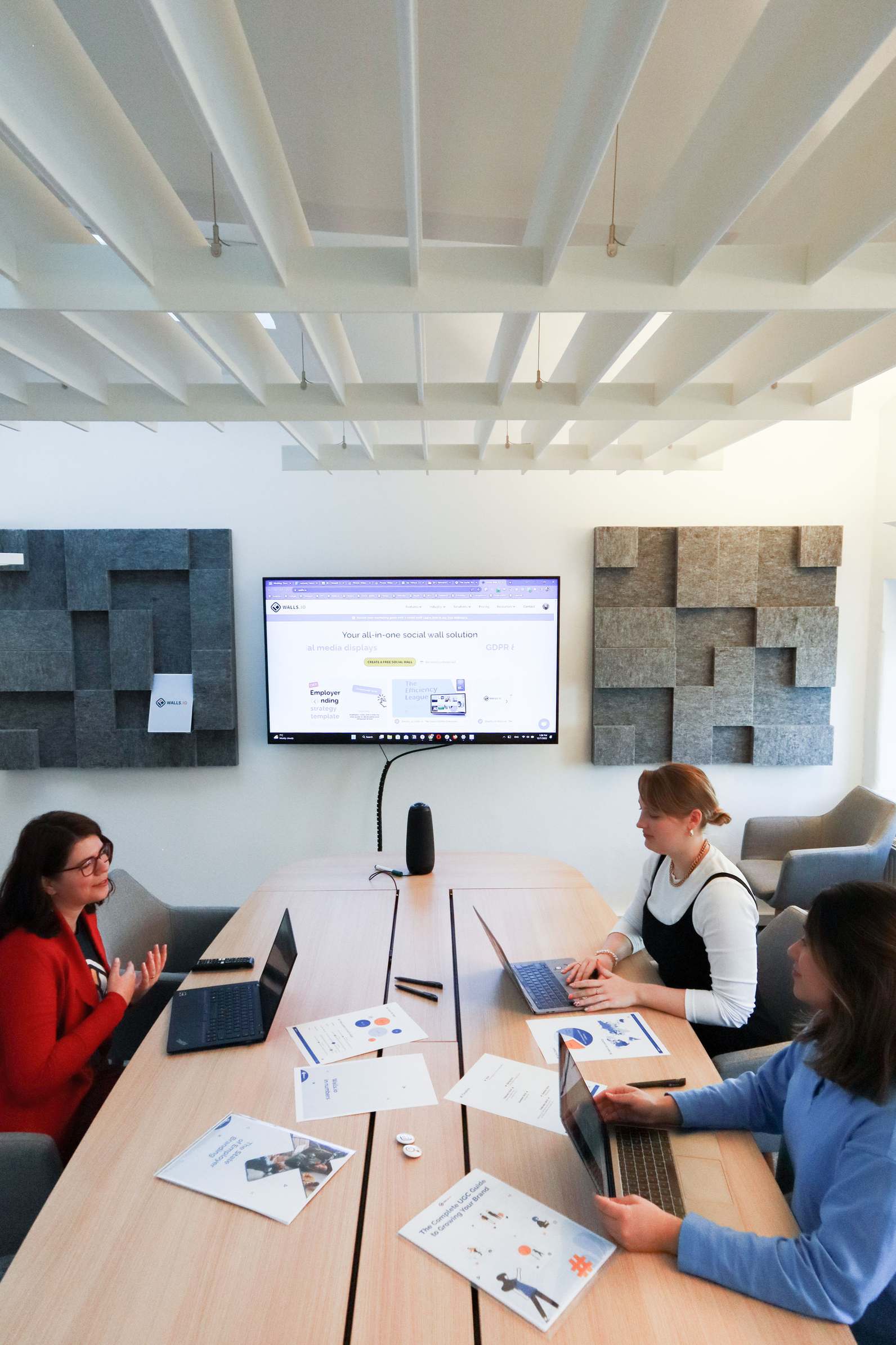 Meeting room with a whiteboard used for architecture discussions, showing an office meeting space